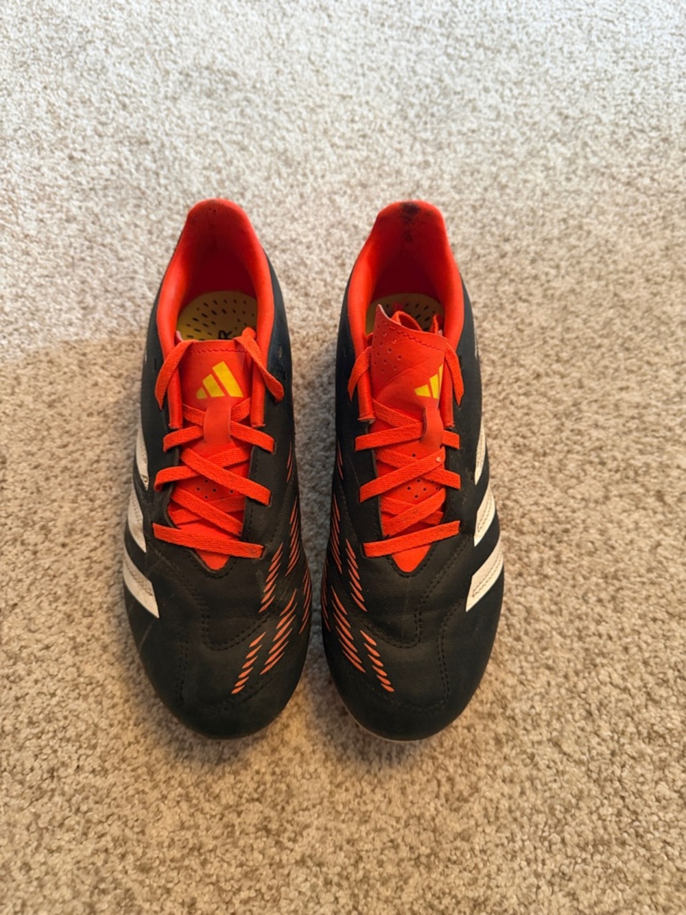 adidas Black and Orange women’s  cleats